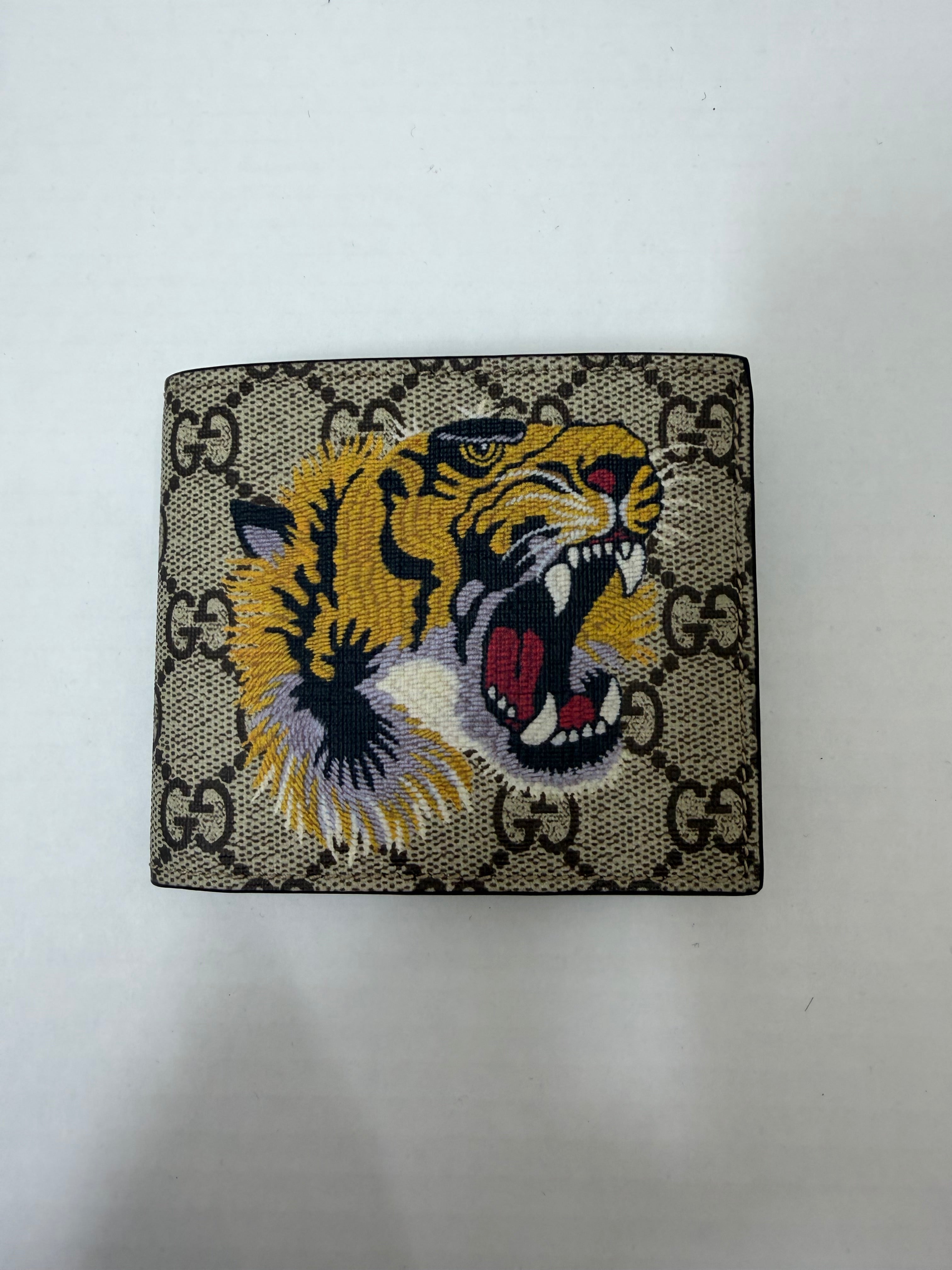 Portafoglio Gucci in tessuto GG Supreme